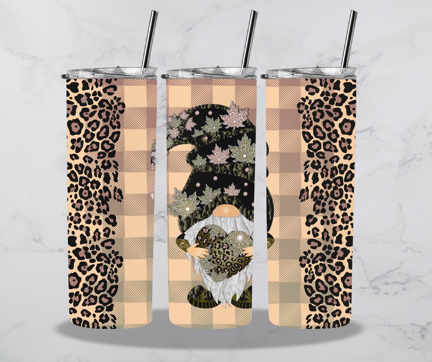 Cheetah Printed Tumbler with Gnome that is holding a heart and has leaves in his hat.