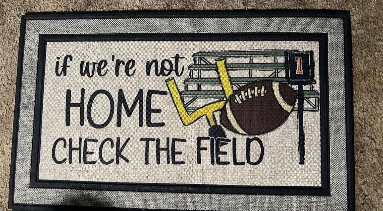 If we’re not home check the field football rug indoor/outdoor 18” by 30”